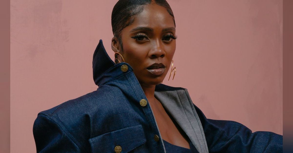 The Review Somebody‘s Son by Tiwa Savage featuring Brandy Shades of Us